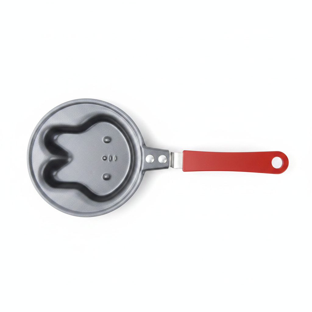 Mini pancake pan with pink silicone mould - studio shot
